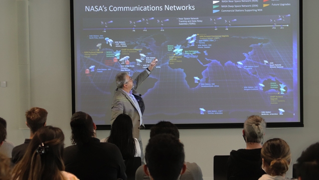 Badri Younes, NASA engineer, explaining NASA’s Communication Networks using a map.
